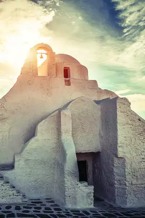Sunrise over one of Mykonos Town's many churches
