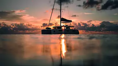 A catamaran at sunset