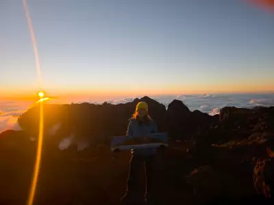 The writer at the summit of Piton des Neiges