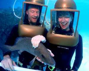 Two helmet divers with a red mullet