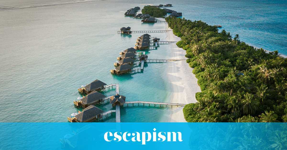 Premium Photo | Beachfront Resort at Sunrise Luxury Beach Landscape