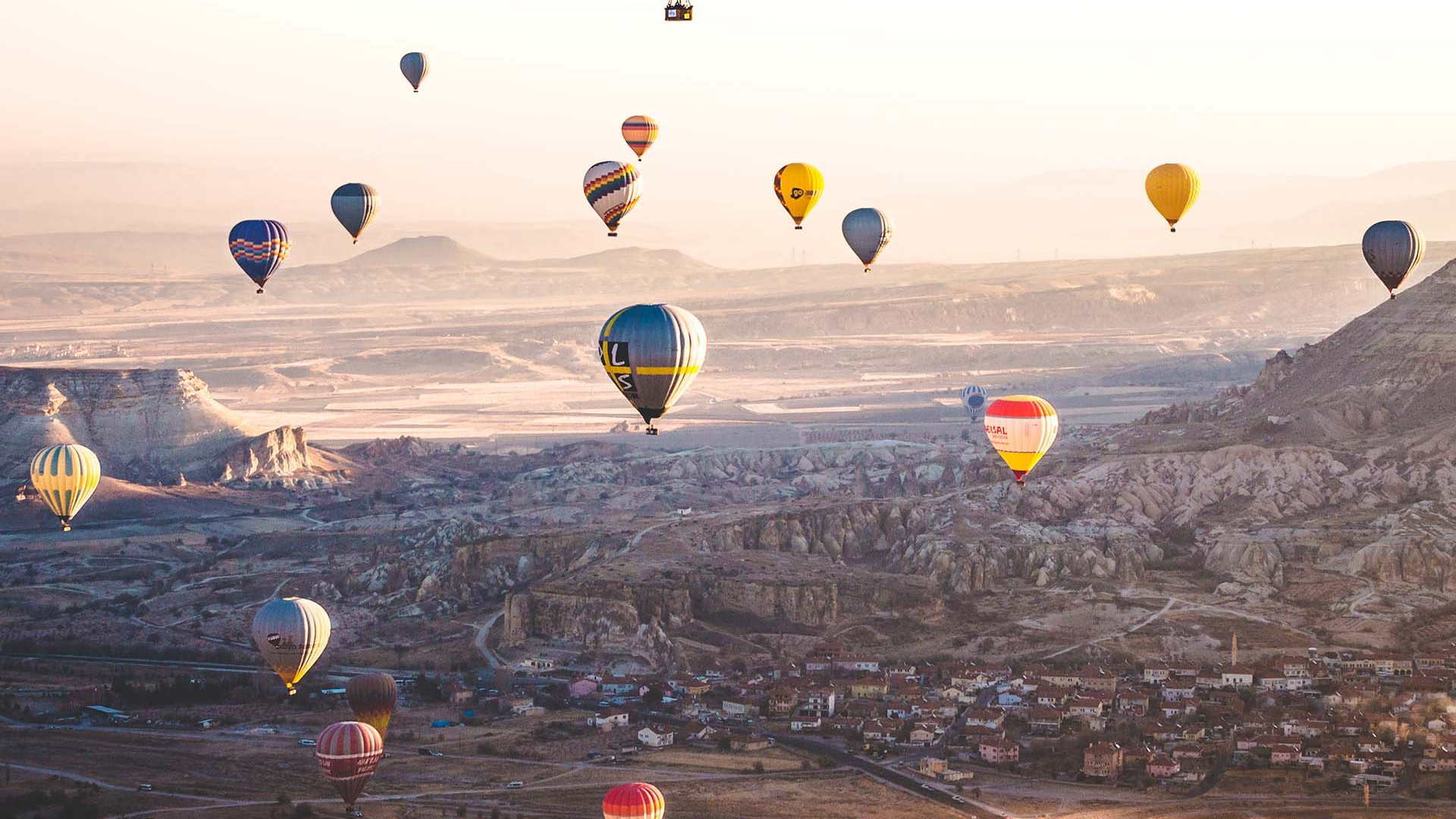 Hot air balloons flying over Cappadocia, Turkey Hot air balloons flying over Cappadocia, Turkey