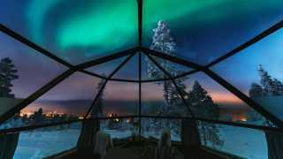 Northern Lights from inside the Glass Igloos at Arctic SnowHotel in Swedish Lapland