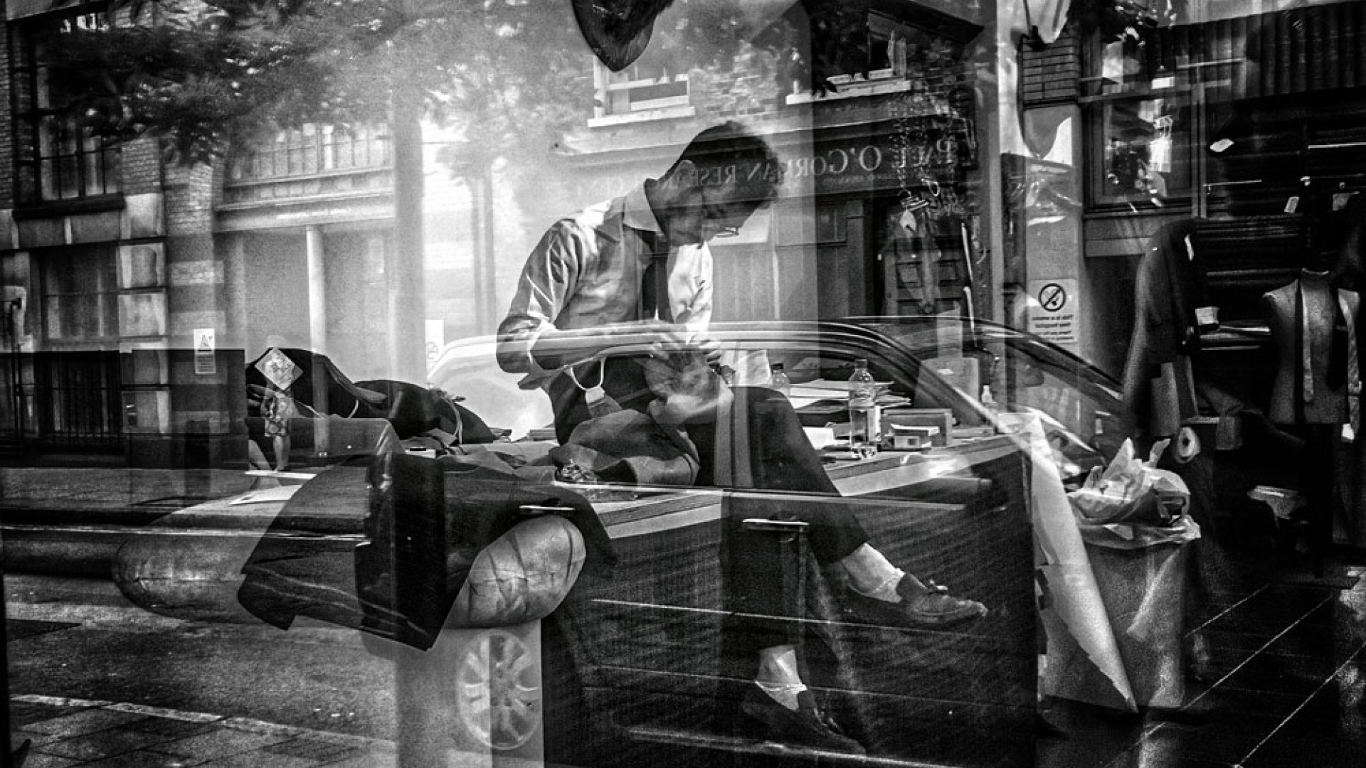 Reflections in the window of a tailor shop on Lambs Conduit Street Reflections in the window of a tailor shop on Lambs Conduit Street