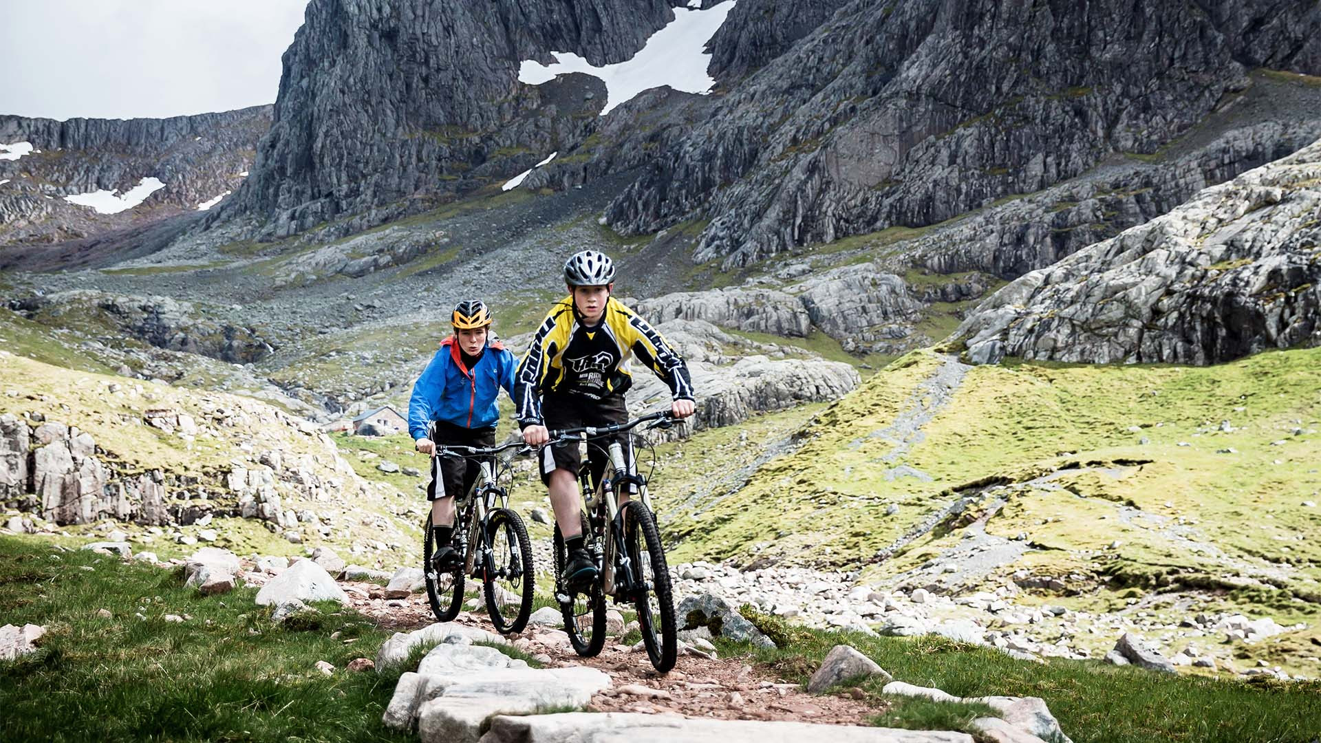 Mountain bikers at Ben Nevis, Scotland Mountain bikers at Ben Nevis, Scotland