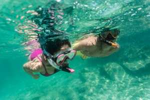 Couple snorkelling in Miami Beach