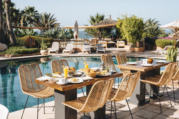 Poolside dining at Paradis Plage