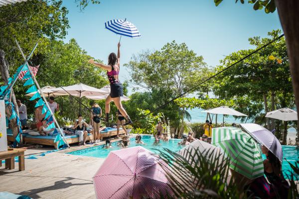 Tightrope walker at Blue Apple Beach