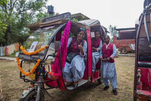 Three drivers for the Pink City Rickshaw company, which employs 200 women