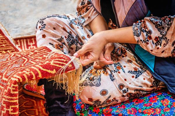 An Uzbek carpet weaver in Khiva