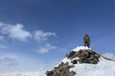 Oleg Gritskevich scouts from a high point