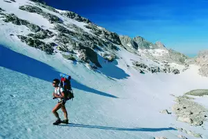 A hiker tackles the Picos de Europa mountain range in the Asturias region A hiker tackles the Picos de Europa mountain range in the Asturias region