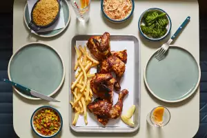 Smokey chipotle and parsley spatchcock chicken, dressed slaw and fries