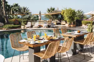 Poolside dining at Paradis Plage Poolside dining at Paradis Plage