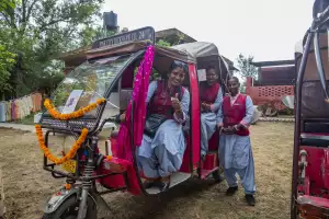 Three drivers for the Pink City Rickshaw company, which employs 200 women Three drivers for the Pink City Rickshaw company, which employs 200 women