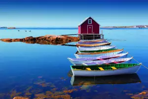 Particoloured punt near Joe Batt's Arm on Fogo Island, Newfoundland Particoloured punt near Joe Batt's Arm on Fogo Island, Newfoundland