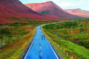 Cycling near the Tablelands on Newfoundland's western seaboard Cycling near the Tablelands on Newfoundland's western seaboard