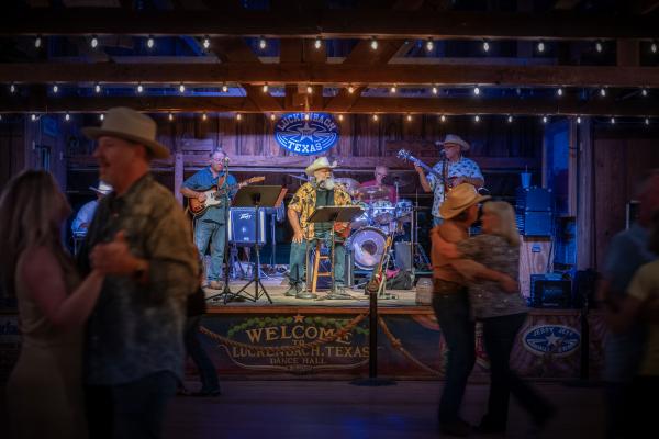 A band playing in Luckenbach, Texas
