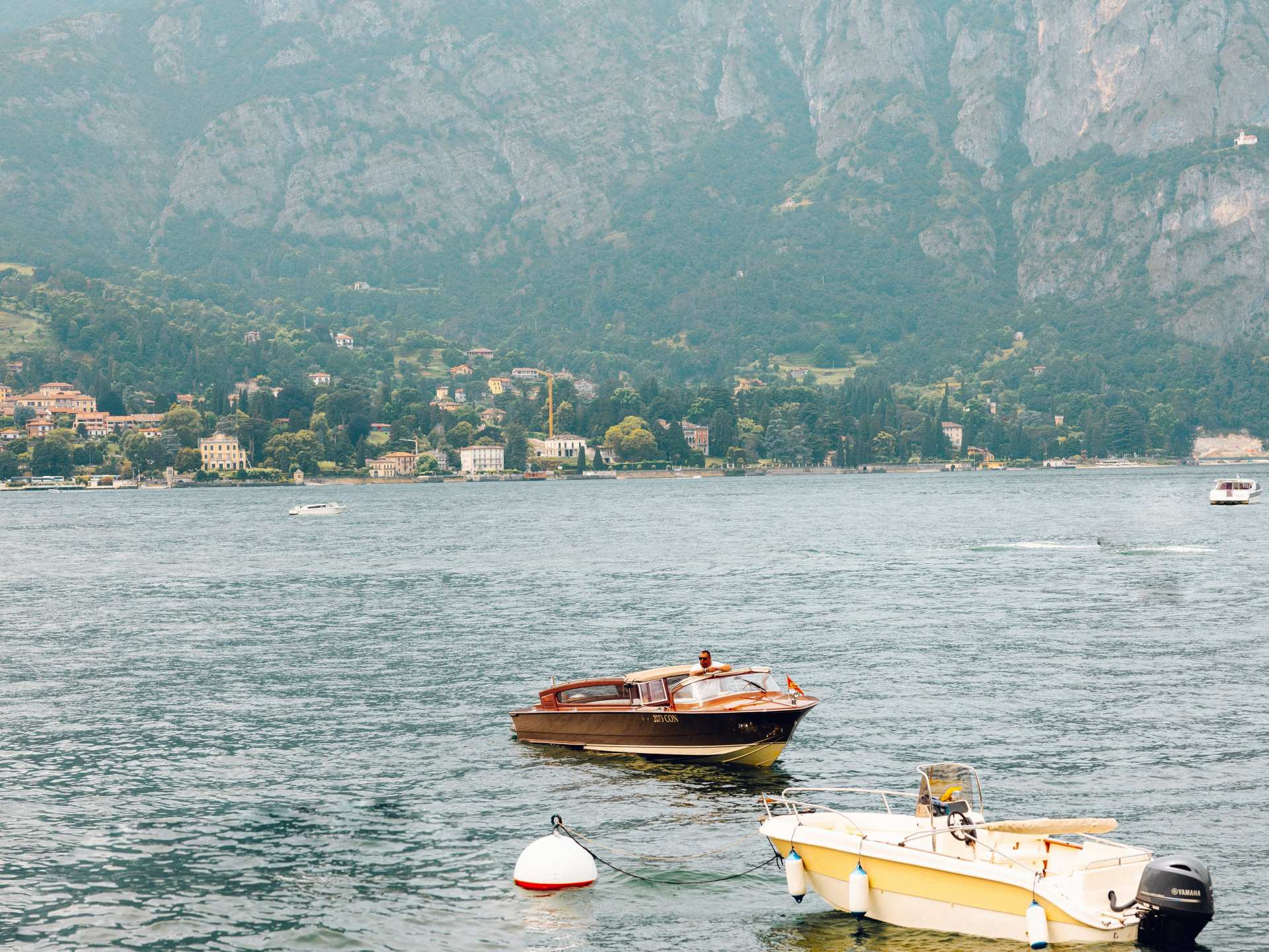 Riding a riva boat on the lake Riding a riva boat on the lake