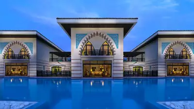 Jumeirah-Zabeel-Saray---Royal-Residences-exterior-sunset-