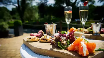 Fizz and canap&eacute;s in the Cotswold sun