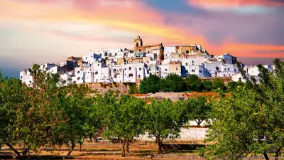 Medieval fortified town of Ostuni at sunset, Puglia, Italy