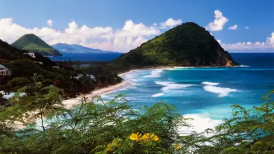 A clifftop view and beach in Tortola