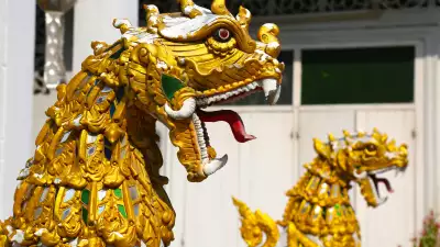 A golden dragon sculpture at a Thai temple