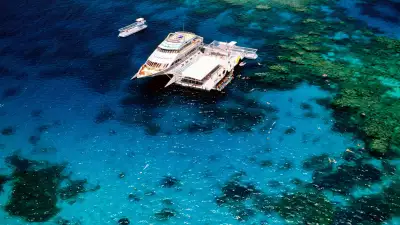 Yacht and deck at Agincourt Reef