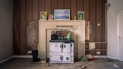 Stove and decorations in abandoned Hebridean home