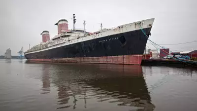 Full exterior shot of the SS United States in harbour