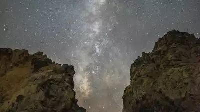 View of the galaxy between two rock in Big Sur, California