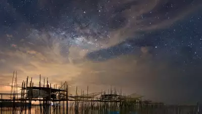 The night sky above a fishing village in Batu Pahat, Malaysia