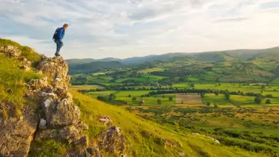 Hiker standing at the top of knipe scar