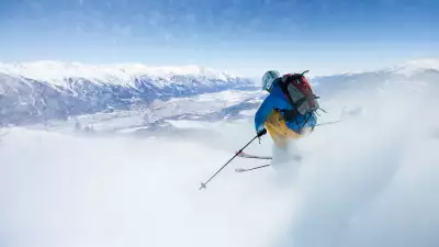 Skiier taking on a jump in Innsbruck, Austria