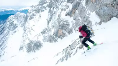 Downhill skiier going off piste in Slovenia
