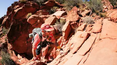 Climbing sandstone on the Grand to Grand run