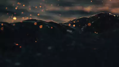 Sparks on a rising wave in sea