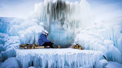 A woman sitting surrounded by ice in a frozen fire pit