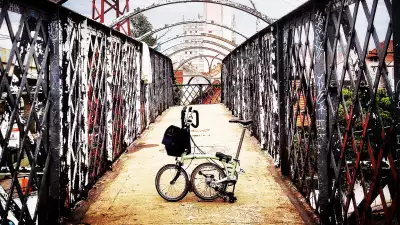 A brompton bike on a bridge in Sao Paolo, Brazil