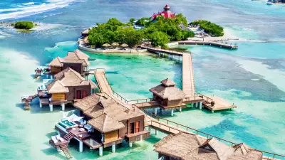 Aerial view of over the water villas at Sandals