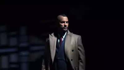 Ricky Whittle, star of American Gods poses in a suit