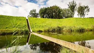 Moses Bridge, a pedestrian through-water bridge in Halsteren, Netherlands