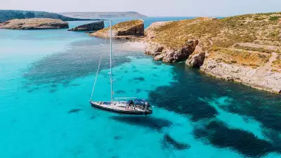 Yachting in Blue Lagoon, off the island of Comino