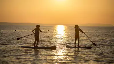 Standup paddle boarding with Neilson at Alana Beach Club, Croatia
