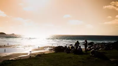 Sitting on the beach at Boardmasters festival in Newquay, Cornwall