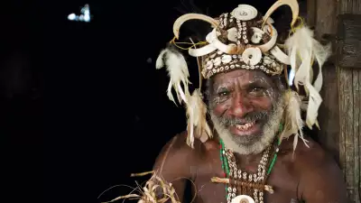 A man in traditional address in the Sepik river region