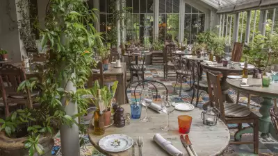 The conservatory dining room at The Pig at Brockenhurst, in the New Forest