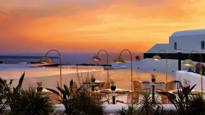A sunset over the pool at Santo Maris Oia