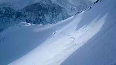 A spitboarder making a surf turn in Sweden